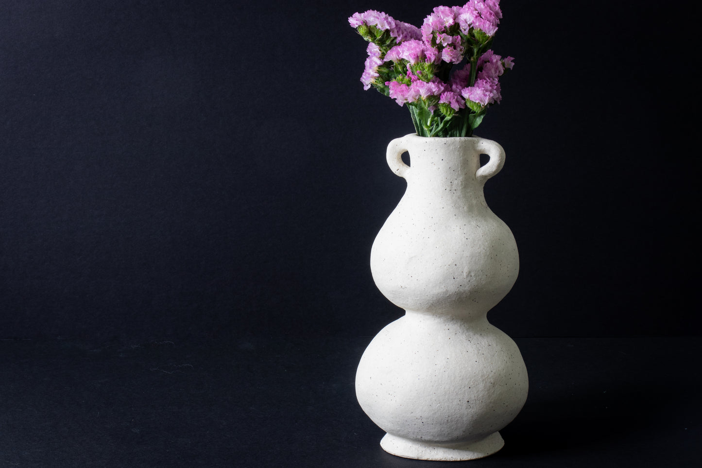 speckled double-tiered vase with handles