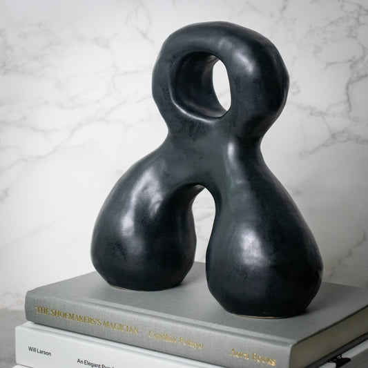 obsidian curve sculpture